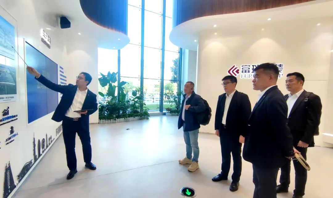 大明國際拜訪富瑞特裝